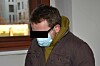 Michal H. měl u Okresního soudu Plzeň – město na ústech roušku. Tvrdil, že je nemocný.